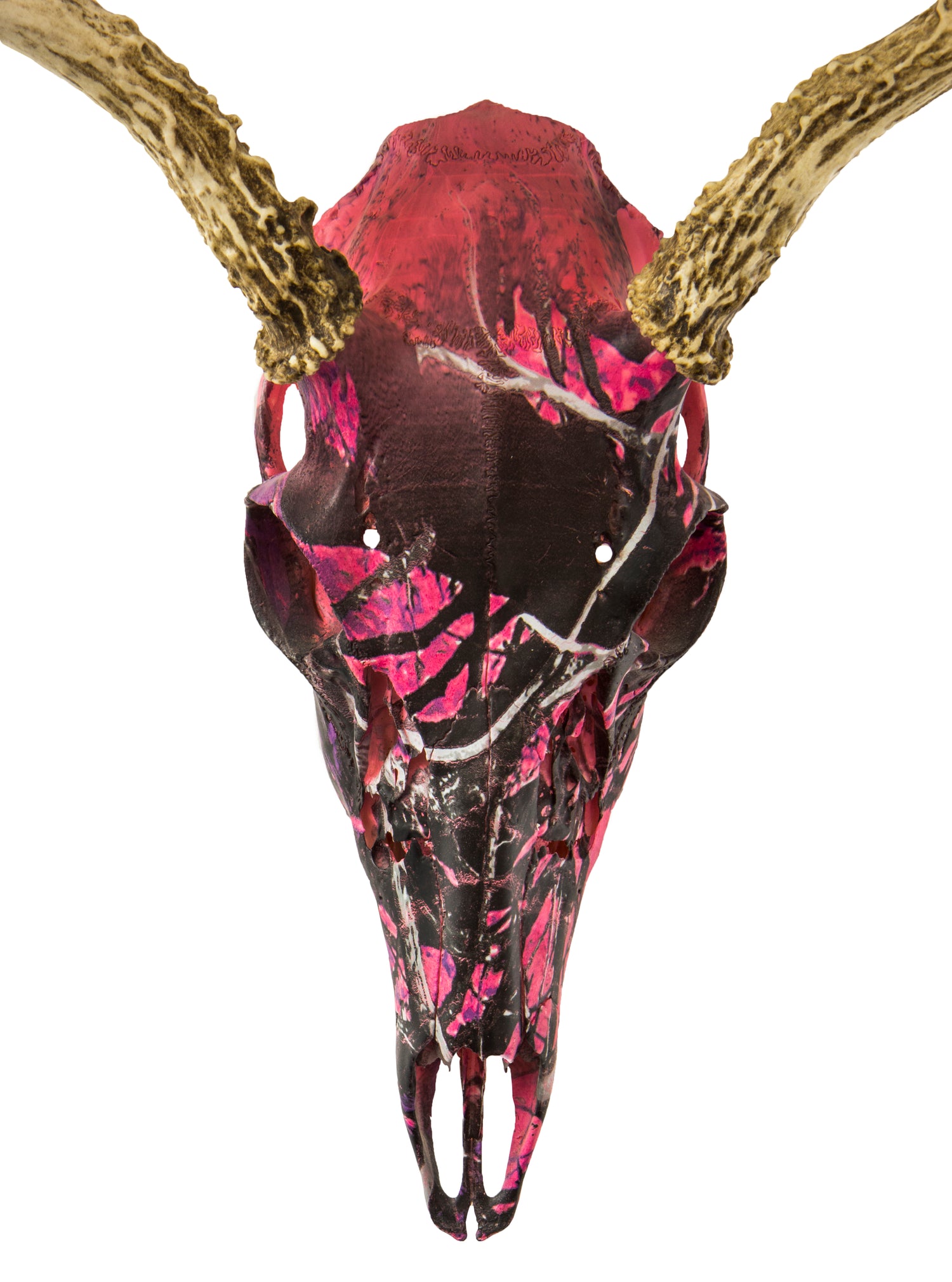 A skull that has been hydrodipped to have a hot pink camo pattern.